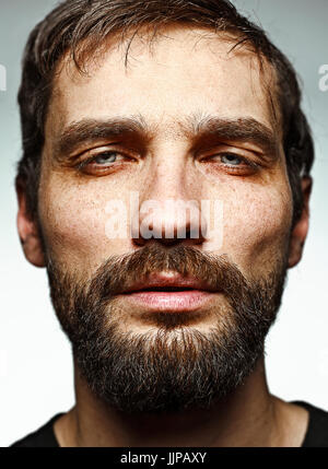 L'homme triste et face closeup Banque D'Images