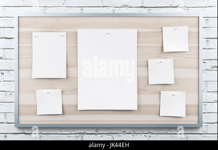 Le poster à bord, livre blanc sur le mur e Banque D'Images