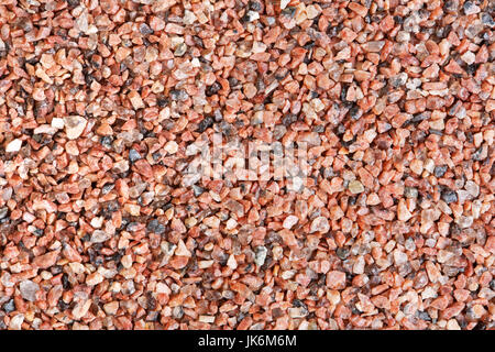 Photo en gros plan de la texture du sable rouge. Banque D'Images