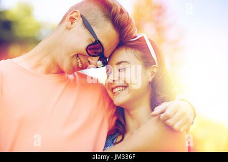 Teenage couple hugging at summer Banque D'Images