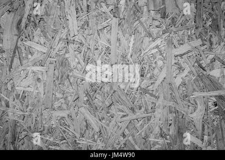 Close-up d'une texture de fond de particules avec le dégradé en noir et blanc. Banque D'Images