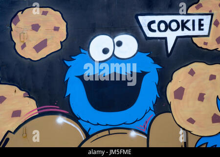 Cookie Monster art de rue sur un mur en angleterre southsea Banque D'Images