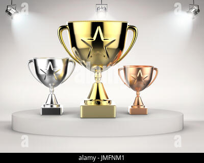 Le rendu 3D gold, silver et bronze trophy sur scène avec des lumières brillantes Banque D'Images