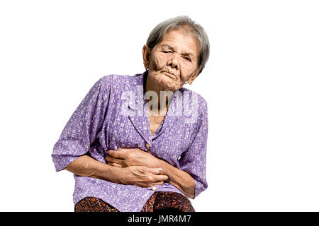 Portrait of a senior woman having un estomac . Isolé sur fond blanc avec clipping path Banque D'Images