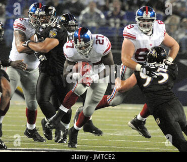 Brandon Jacobs of the New York Giants runs the ball against James  Laurinaitis of the St. Louis Rams at MetLife Stadium on Monday, September  19, 2011, in East Rutherford, New Jersey. (Photo