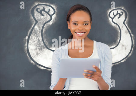 Part flexing muscles sur fond blanc contre Vue de face d'un black woman looking at camera Banque D'Images