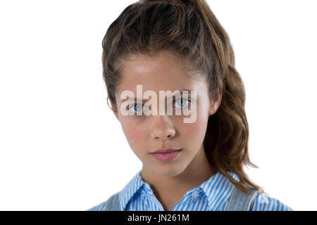 Portrait of teenage girl against white background Banque D'Images