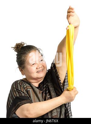 Portrait of a young woman exercising. Isolé sur fond blanc avec clipping path Banque D'Images