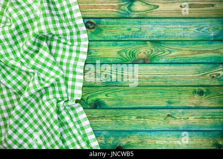 Nappe à carreaux vert sur la table en bois, vue du dessus, copy space Banque D'Images