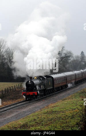 'Foremarke Hall' près de Gretton avec un Toddington - Cheltenham Racecourse train. Banque D'Images