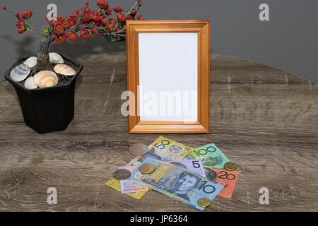 Cadre vide à remplir avec une photo et le dollar australien et des billets le tableau Banque D'Images