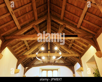 Toiture en bois de bois, poutres, poutrelles et fermes, les conseils scolaires dans une grande église Asby, Cumbria, Angleterre, Royaume-Uni Banque D'Images