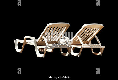 Deux chaises longues isolated on black with clipping path Banque D'Images