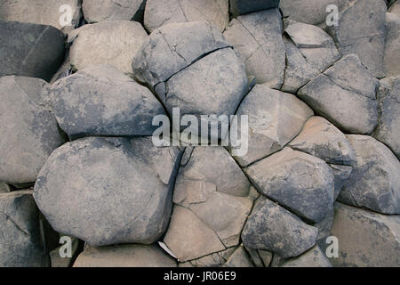 Lit de roches volcaniques basaltiques hexagonales colonnes à la Giant's Causeway Coast - Le Site du patrimoine mondial naturel de l'Irlande du Nord d'Antrim Bushmills Banque D'Images