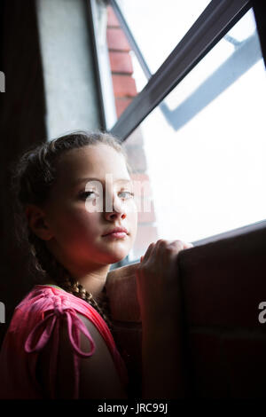 Portrait of teenage Girl standing near window in fitness studio Banque D'Images