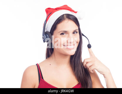 Casque femme de Noël centre d'appels de télémarketing porter du rouge santa hat smiling parlant isolé sur fond blanc. Banque D'Images