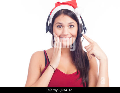 Casque femme de Noël centre d'appels de télémarketing porter du rouge santa hat smiling parlant isolé sur fond blanc. Banque D'Images