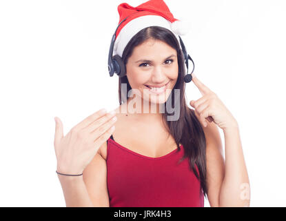 Casque femme de Noël centre d'appels de télémarketing porter du rouge santa hat smiling parlant isolé sur fond blanc. Banque D'Images