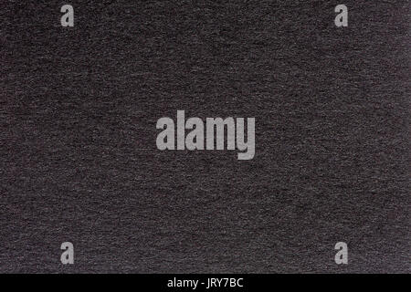 La texture du papier noir froissé ou l'arrière-plan en papier. Banque D'Images