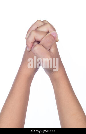 Les mains de l'enfant pliées ensemble dans la prière en isolé sur fond blanc Banque D'Images