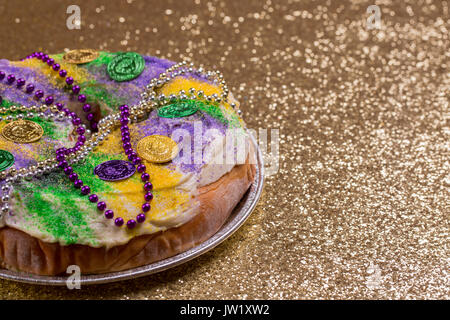 King Cake sur Gold Glitter Banque D'Images