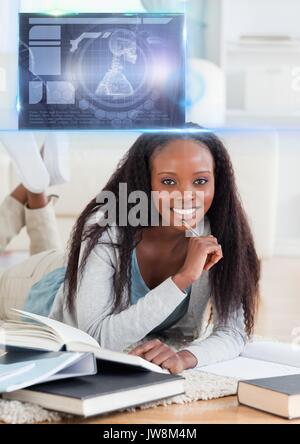 Digital composite of Female student étudiant avec réserve et les sciences de l'éducation recouvrement graphique interface Banque D'Images