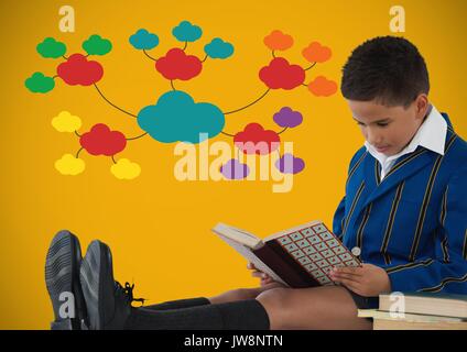 Digital composite de Boy reading en face de nuages colorés sur fond jaune Banque D'Images