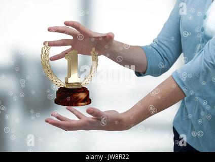 Digital composite de Femme avec un trophée sur les mains Banque D'Images