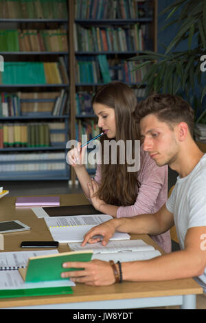 High angle view of college students studying in classroom Banque D'Images