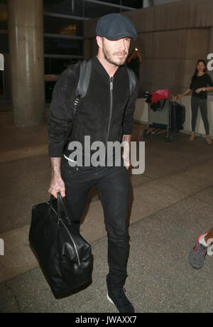 LOS ANGELES, CA - le 16 octobre : David Beckham vu en arrivant à l'aéroport de LAX le 16 octobre 2014. Crédit : John Misa/MediaPunch Banque D'Images