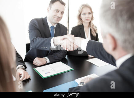 Business people shaking hands, finir une séance Banque D'Images