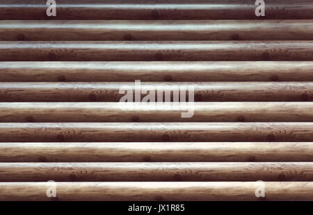 Main modernes naturelles taillées Log Cabin Façade Mur Texture du fragment. Log mur rustique Bois Horizontal arrière-plan. Fragment de bois non peint écorcées L Banque D'Images