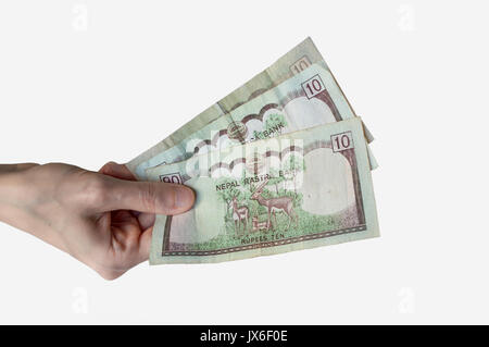 Woman holding trente roupies Népal billets dans sa main Banque D'Images