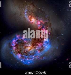 Les galaxies des antennes ou NGC 4038 NGC 4039 ou font l'objet d'une collision galactique. Situé dans la constellation Corvus. Image retouchée. Éléments de t Banque D'Images