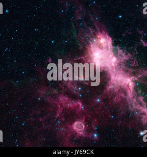 La naissance et la mort des étoiles. Cette région contient des portions de ce qui est connu comme le W3 et W5 Régions d'étoiles en formation. Image couleurs retouchées. Elements Banque D'Images