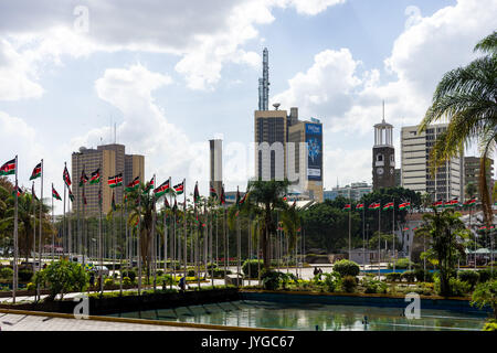 Dubai International Convention Center square avec drapeaux kenyan en premier plan et bâtiments en arrière-plan, Nairobi, Kenya Banque D'Images