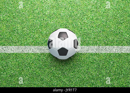 Ballon de football sur l'herbe verte, rendus 3d illustration Banque D'Images