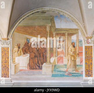 Fresque de Sodoma, comment Benoît, avec le signe de la croix, casse un verre de vin empoisonné, l'abbaye de Monte Oliveto Maggiore,Toscane, Italie Banque D'Images
