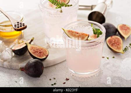 Cocktail rose fig avec le miel et le thym Banque D'Images