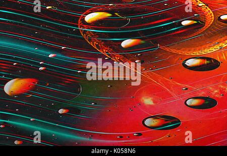 Abstract background texture fantastique mouvement en spirale de particules en forme ovale de couleur de taille différente dans l'espace Banque D'Images