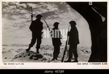 WW2 - coucher de soleil sur le front occidental - soldats britanniques sur la garde Banque D'Images