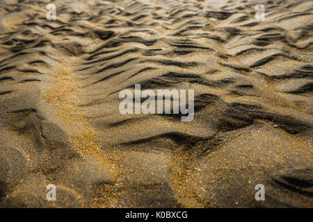 Close up de sable d'une plage - paysage exotique, proche de la planète mars, rouge, or Banque D'Images