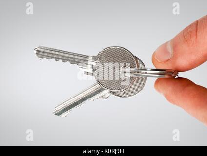 Digital composite of Hand holding keys Banque D'Images