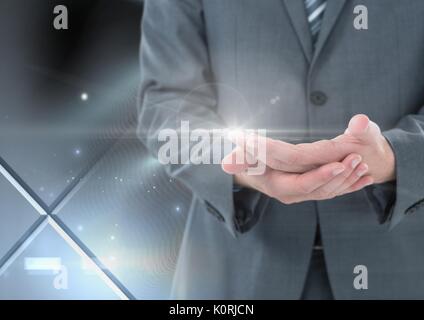 Digital composite of hands holding et l'interaction avec l'effet de transition Banque D'Images