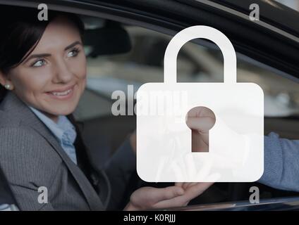 Digital composite de l'icône cadenas contre femme heureuse dans la voiture Banque D'Images