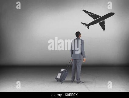 Digital composite de Businessman avec un sac de voyage à la recherche jusqu'à l'icône avion Banque D'Images