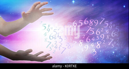 Les gestes des mains contre l'arrière-plan blanc contre l'image composite numériquement de lumières colorées Banque D'Images
