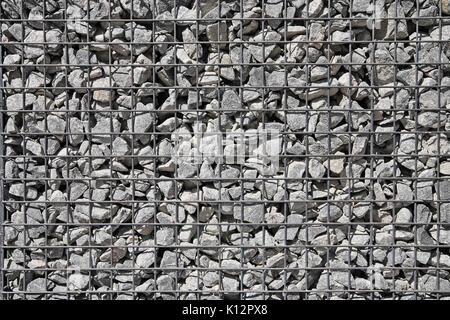 Le gravier dans la grille close-up Banque D'Images