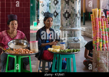 Snack-fournisseurs en Paya Mahamuni, Mandalay, Myanmar. Banque D'Images