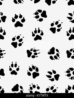 Une structure de silhouettes noires d'impressions de dog paw Banque D'Images